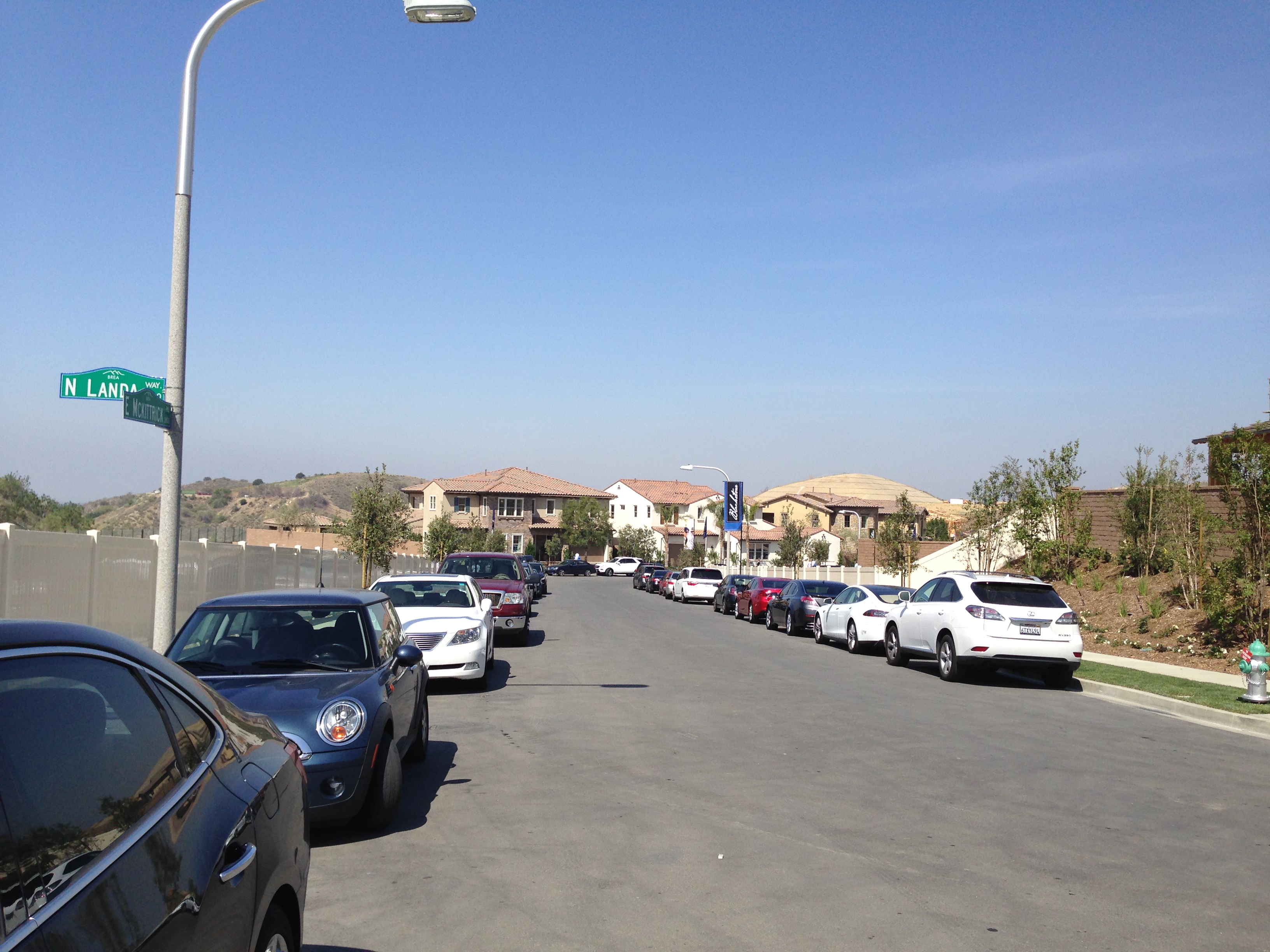 Guests had to park down the street after Avignon's small lot and curbs filled near the models.